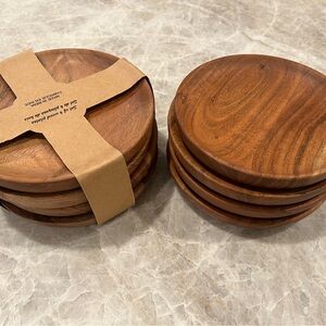 Set of 8 wood plates. New, never used. 6.75 inch diameter.